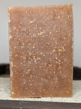 Load image into Gallery viewer, Brown soap bar with a textured surface on a neutral background