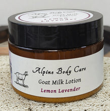 Load image into Gallery viewer, Jar of Alpine Body Care Goat Milk Lotion with Lemon Lavender scent on a textured surface.
